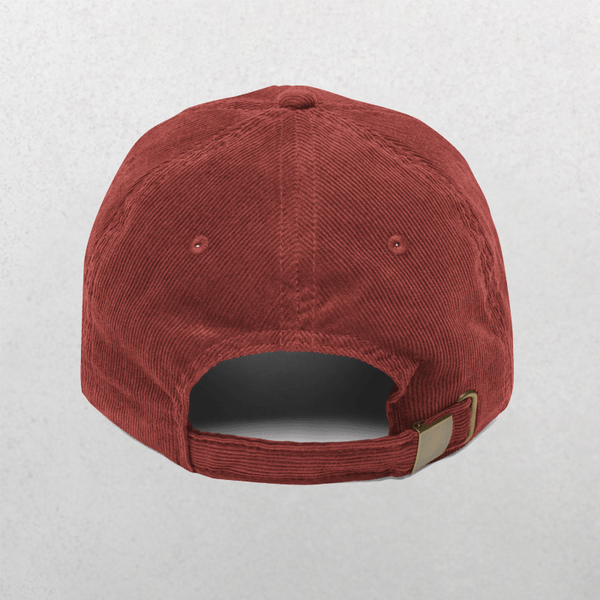 The Chord Vintage Cap - Anti Social Dog Owner is shown from the back in maroon corduroy, with an adjustable strap and metal buckle. Visible stitching runs along the panels, set against a plain light gray background.