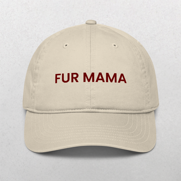The Classic Organic Dad Cap - Furr Mama: a beige cap embroidered with bold, dark red FUR MAMA lettering—perfect as a fun gift for dog lovers or as a stylish, thoughtful dog dad cap.