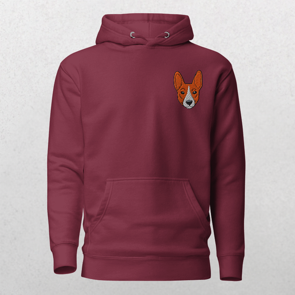 The Embroidered Custom Pet Hoodie in maroon features a small orange and white dog face embroidered on the left chest, shown on a light gray background.