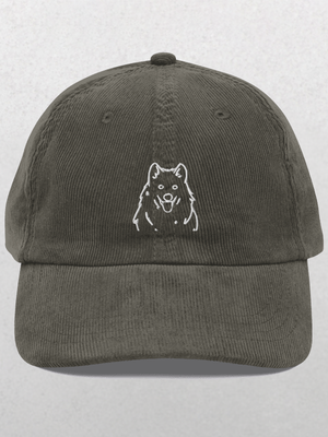The Custom Pet Line Art Portrait Corduroy Cap – Embroidered Pet Hat in grey features a simple white embroidered outline of a fluffy dog, making it a unique pet keepsake.