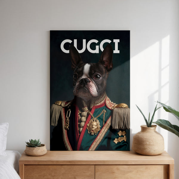 A custom pet portrait, “Gucci Fashion Cover,” of a Boston Terrier in ornate military attire hangs above a wooden dresser with vases and a plant. The canvas features CUGCI, making it the perfect personalized dog lover gift for any home.